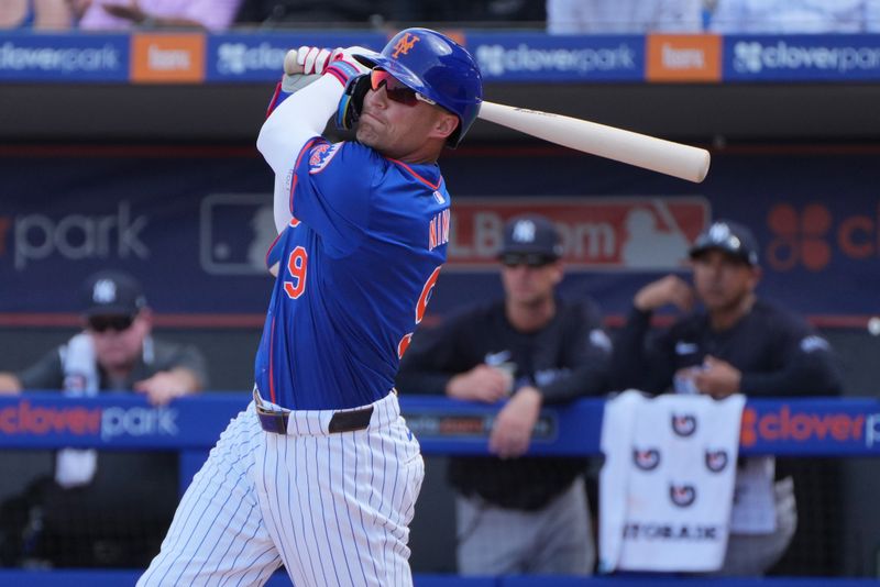 Mar 5, 2024; Port St. Lucie, Florida, USA;  New York Mets center fielder Brandon Nimmo (9) hits a double in the third inning against the New York Yankees at Clover Park. Mandatory Credit: Jim Rassol-USA TODAY Sports