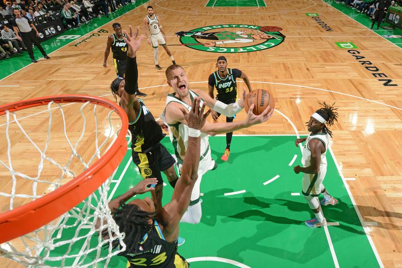 BOSTON, MA - JANUARY 30: Kristaps Porzingis #8 of the Boston Celtics drives to the basket during the game against the Indiana Pacers on January 30, 2024 at the TD Garden in Boston, Massachusetts. NOTE TO USER: User expressly acknowledges and agrees that, by downloading and or using this photograph, User is consenting to the terms and conditions of the Getty Images License Agreement. Mandatory Copyright Notice: Copyright 2024 NBAE  (Photo by Brian Babineau/NBAE via Getty Images)