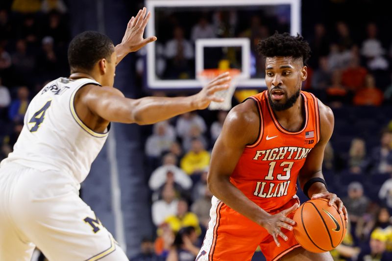 Jan 18, 2024; Ann Arbor, Michigan, USA;  Illinois Fighting Illini forward Quincy Guerrier (13) dribbles defended by Illinois Fighting Illini guard Justin Harmon (4) in the second half at Crisler Center. Mandatory Credit: Rick Osentoski-USA TODAY Sports