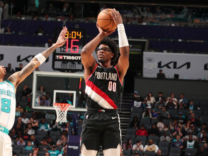 CHARLOTTE, NC - APRIL 3: Scoot Henderson #00 of the Portland Trail Blazers shoots a 3-point basket during the game  on April 3, 2024 at Spectrum Center in Charlotte, North Carolina. NOTE TO USER: User expressly acknowledges and agrees that, by downloading and or using this photograph, User is consenting to the terms and conditions of the Getty Images License Agreement. Mandatory Copyright Notice: Copyright 2024 NBAE (Photo by Kent Smith/NBAE via Getty Images)