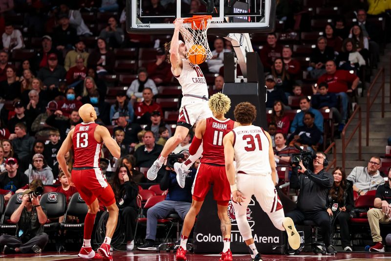 Feb 4, 2023; Columbia, South Carolina, USA; South Carolina Gamecocks forward Hayden Brown (10) dunks against the Arkansas Razorbacks in the second half at Colonial Life Arena. Mandatory Credit: Jeff Blake-USA TODAY Sports