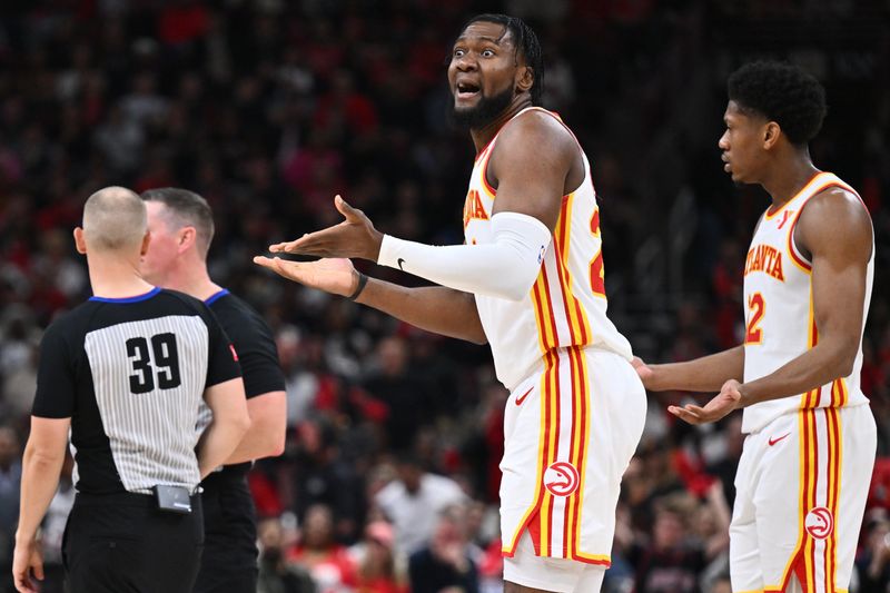 CHICAGO, ILLINOIS - APRIL 17:  Bruno Fernando #24 of the Atlanta Hawks reacts after being given a warning by the referees in the second half against the Chicago Bulls on April 17, 2024 at United Center in Chicago, Illinois. Chicago defeated Atlanta 131-116.   NOTE TO USER: User expressly acknowledges and agrees that, by downloading and or using this photograph, User is consenting to the terms and conditions of the Getty Images License Agreement.  (Photo by Jamie Sabau/Getty Images)