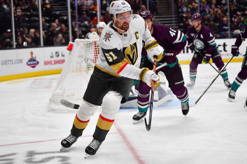 Dec 27, 2023; Anaheim, California, USA; Vegas Golden Knights right wing Mark Stone (61) passes the puck against the Anaheim Ducks during the second period at Honda Center. Mandatory Credit: Gary A. Vasquez-USA TODAY Sports