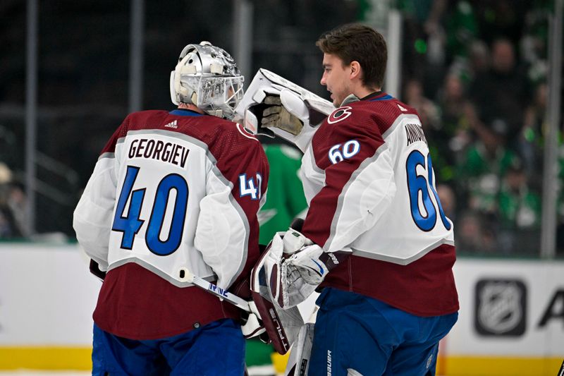 May 7, 2024; Dallas, Texas, USA; Colorado Avalanche goaltender Alexandar Georgiev (40) and goaltender Justus Annunen (60) celebrate the win over the Dallas Stars in the overtime period in game one of the second round of the 2024 Stanley Cup Playoffs at American Airlines Center. Mandatory Credit: Jerome Miron-USA TODAY Sports