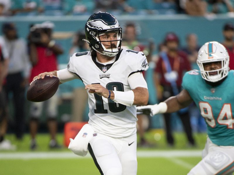 Philadelphia Eagles quarterback Gardner Minshew (10) looks to throw the ball during an NFL football game against the Miami Dolphins, Saturday, Aug. 27, 2022, in Miami Gardens, Fla. (AP Photo/Doug Murray)