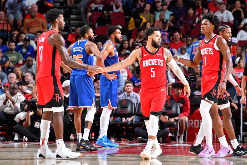 HOUSTON, TX - NOVEMBER 4: Tari Eason #17 and Fred VanVleet #5 of the Houston Rockets high five during the game against the New York Knicks on November 4, 2024 at the Toyota Center in Houston, Texas. NOTE TO USER: User expressly acknowledges and agrees that, by downloading and or using this photograph, User is consenting to the terms and conditions of the Getty Images License Agreement. Mandatory Copyright Notice: Copyright 2024 NBAE (Photo by Logan Riely/NBAE via Getty Images)