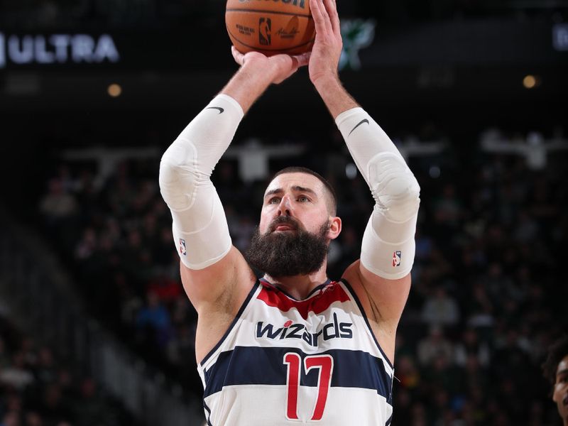 MILWAUKEE, WI - NOVEMBER 30: Jonas Valanciunas #17 of the Washington Wizards shoots a free throw during the game against the Milwaukee Bucks on November 30, 2024 at Fiserv Forum Center in Milwaukee, Wisconsin. NOTE TO USER: User expressly acknowledges and agrees that, by downloading and or using this Photograph, user is consenting to the terms and conditions of the Getty Images License Agreement. Mandatory Copyright Notice: Copyright 2024 NBAE (Photo by Gary Dineen/NBAE via Getty Images).