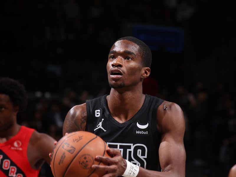 BROOKLYN, NY - DECEMBER 2: Edmond Sumner #4 of the Brooklyn Nets prepares to shoot a free throw during the game against the Toronto Raptors on December 2, 2022 at Barclays Center in Brooklyn, New York. NOTE TO USER: User expressly acknowledges and agrees that, by downloading and or using this Photograph, user is consenting to the terms and conditions of the Getty Images License Agreement. Mandatory Copyright Notice: Copyright 2022 NBAE (Photo by Nathaniel S. Butler/NBAE via Getty Images)