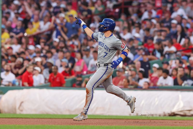 Jul 12, 2024; Boston, Massachusetts, USA; Kansas City Royals shortstop Bobby Witt Jr (7) celebrates after hitting a home run during the fourth inning against the Boston Red Sox at Fenway Park. Mandatory Credit: Paul Rutherford-USA TODAY Sports