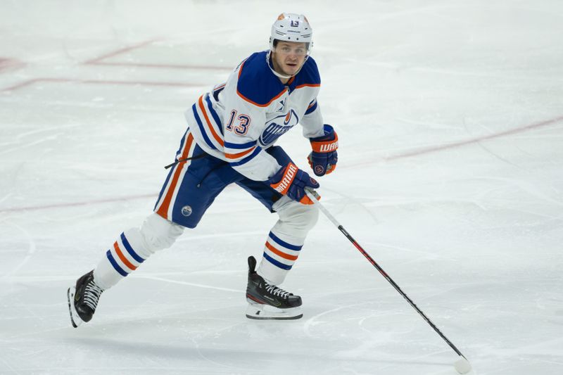 Nov 19, 2024; Ottawa, Ontario, CAN; Edmonton Oilers center Mattias Ekhollm (14) skates in the third period against the Ottawa Senators at the Canadian Tire Centre. Mandatory Credit: Marc DesRosiers-Imagn Images