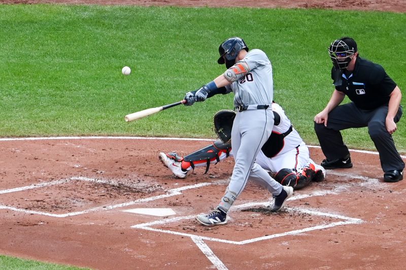 Sep 22, 2024; Baltimore, Maryland, USA;  Detroit Tigers first baseman Spencer Torkelson (20) hits a solo homerun against the Baltimore Orioles during the second inning  at Oriole Park at Camden Yards. Mandatory Credit: Tommy Gilligan-Imagn Images