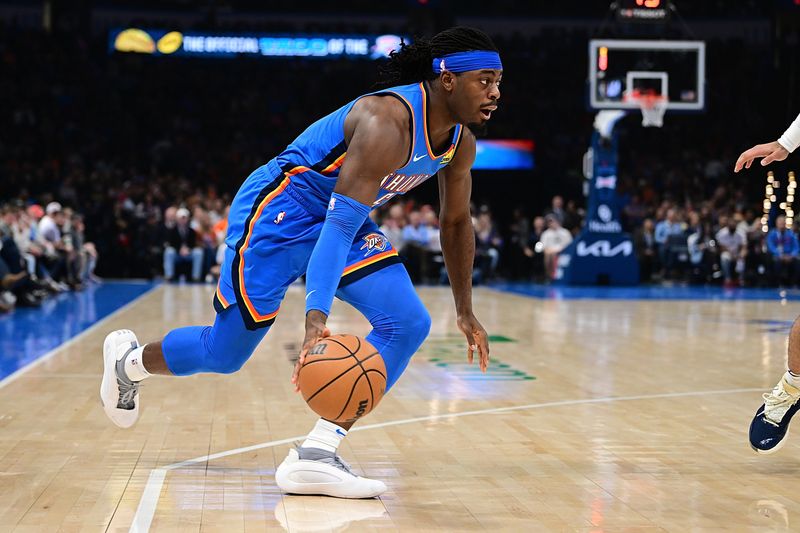 OKLAHOMA CITY, OKLAHOMA - JANUARY 31: Luguentz Dort #5 of the Oklahoma City Thunder handles the ball during the first half against the Denver Nuggets at Paycom Center on January 31, 2024 in Oklahoma City, Oklahoma. NOTE TO USER: User expressly acknowledges and agrees that, by downloading and or using this Photograph, user is consenting to the terms and conditions of the Getty Images License Agreement. (Photo by Joshua Gateley/Getty Images)