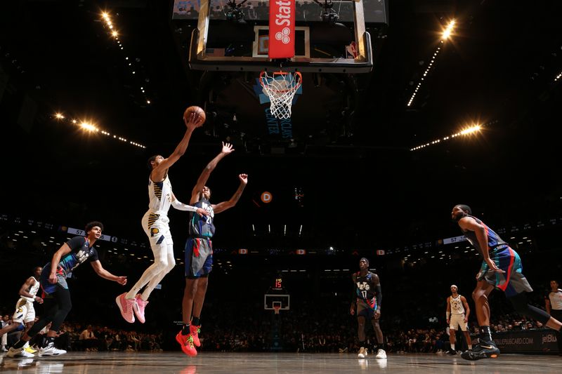 BROOKLYN, NY - APRIL 3: Tyrese Haliburton #0 of the Indiana Pacers drives to the basket during the game against the Brooklyn Nets on April 3, 2024 at Barclays Center in Brooklyn, New York. NOTE TO USER: User expressly acknowledges and agrees that, by downloading and or using this Photograph, user is consenting to the terms and conditions of the Getty Images License Agreement. Mandatory Copyright Notice: Copyright 2024 NBAE (Photo by Nathaniel S. Butler/NBAE via Getty Images)