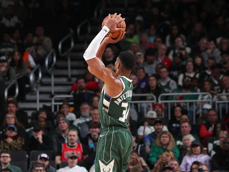 MILWAUKEE, WI - NOVEMBER 20: Giannis Antetokounmpo #34 of the Milwaukee Bucks shoots the ball during the game against the Chicago Bulls on November 20, 2024 at the Fiserv Forum Center in Milwaukee, Wisconsin. NOTE TO USER: User expressly acknowledges and agrees that, by downloading and or using this Photograph, user is consenting to the terms and conditions of the Getty Images License Agreement. Mandatory Copyright Notice: Copyright 2024 NBAE (Photo by Gary Dineen/NBAE via Getty Images).