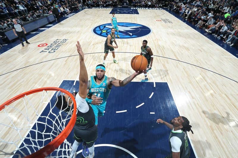 MINNEAPOLIS, MN -  JANUARY 22: Miles Bridges #0 of the Charlotte Hornets shoots the ball during the game against the Minnesota Timberwolves on January 22, 2024 at Target Center in Minneapolis, Minnesota. NOTE TO USER: User expressly acknowledges and agrees that, by downloading and or using this Photograph, user is consenting to the terms and conditions of the Getty Images License Agreement. Mandatory Copyright Notice: Copyright 2024 NBAE (Photo by David Sherman/NBAE via Getty Images)