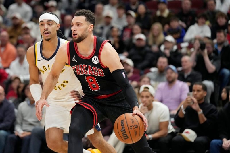 CHICAGO, ILLINOIS - DECEMBER 06: Zach LaVine #8 of the Chicago Bulls dribbles the ball against Andrew Nembhard #2 of the Indiana Pacers during the first quarter of a game at the United Center on December 06, 2024 in Chicago, Illinois. NOTE TO USER: User expressly acknowledges and agrees that, by downloading and or using this photograph, User is consenting to the terms and conditions of the Getty Images License Agreement. (Photo by Patrick McDermott/Getty Images)