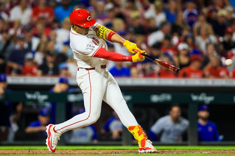 Jul 29, 2024; Cincinnati, Ohio, USA; Cincinnati Reds third baseman Noelvi Marte (16) hits a double against the Chicago Cubs in the eighth inning at Great American Ball Park. Mandatory Credit: Katie Stratman-USA TODAY Sports