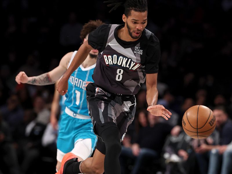 NEW YORK, NEW YORK - FEBRUARY 10: Ziaire Williams #8 of the Brooklyn Nets steals the ball from LaMelo Ball #1 of the Charlotte Hornets in the first half at Barclays Center on February 10, 2025 in the Brooklyn borough of New York City. NOTE TO USER: User expressly acknowledges and agrees that, by downloading and or using this photograph, User is consenting to the terms and conditions of the Getty Images License Agreement. (Photo by Elsa/Getty Images)