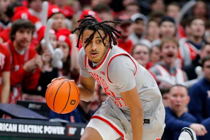 Jan 30, 2024; Columbus, Ohio, USA; Ohio State Buckeyes forward Devin Royal (21) picks up the loose ball during the second half against the Illinois Fighting Illini at Value City Arena. Mandatory Credit: Joseph Maiorana-USA TODAY Sports