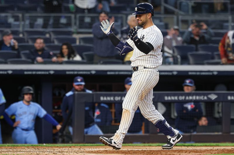 Apr 27, 2025; Bronx, New York, USA; New York Yankees catcher J.C. Escarra (25) scores after hitting a solo home run during the eighth inning against the Toronto Blue Jays at Yankee Stadium. Mandatory Credit: Vincent Carchietta-Imagn Images