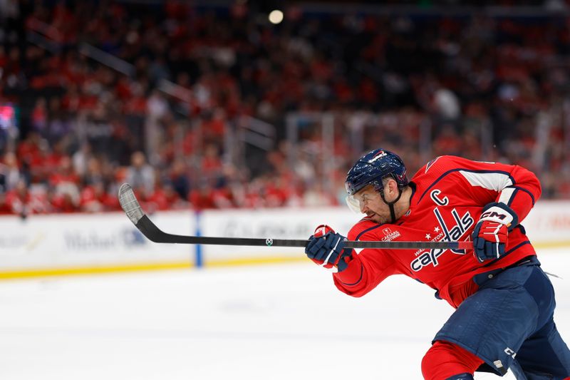 Mar 3, 2024; Washington, District of Columbia, USA; Washington Capitals left wing Alex Ovechkin (8) shoots the puck against the Arizona Coyotes in the third period at Capital One Arena. Mandatory Credit: Geoff Burke-USA TODAY Sports