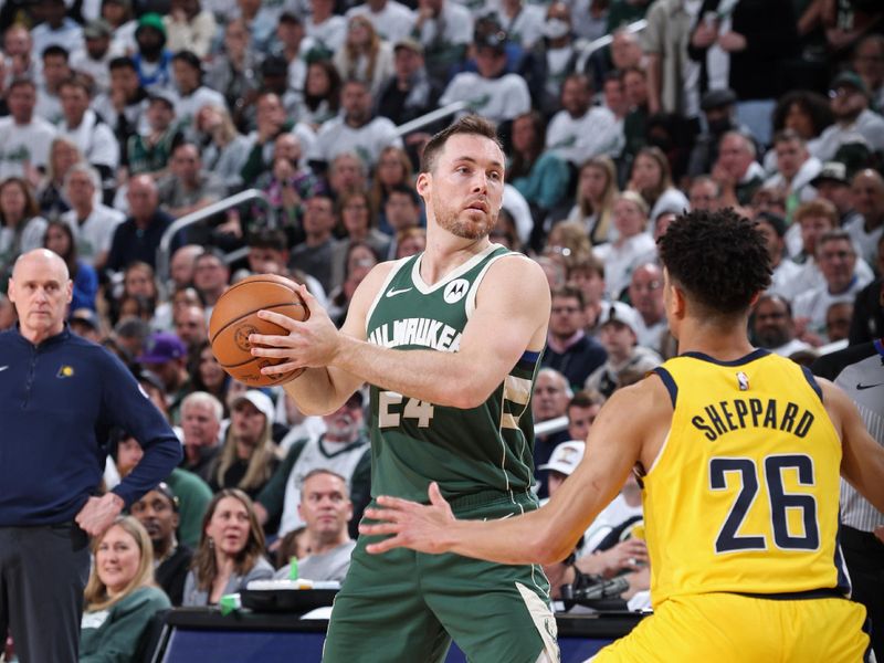 MILWAUKEE, WI - APRIL 23: Pat Connaughton #24 of the Milwaukee Bucks looks to pass the ball during Round 1 Game 2 of the 2024 NBA Playoffs against the Indiana Pacers on April 23, 2024 at the Fiserv Forum Center in Milwaukee, Wisconsin. NOTE TO USER: User expressly acknowledges and agrees that, by downloading and or using this Photograph, user is consenting to the terms and conditions of the Getty Images License Agreement. Mandatory Copyright Notice: Copyright 2024 NBAE (Photo by Jeff Haynes/NBAE via Getty Images).