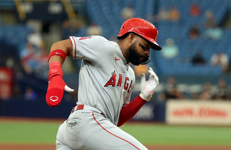 Sep 21, 2023; St. Petersburg, Florida, USA; Los Angeles Angels right fielder Jo Adell (7) runs home to score a run against the Tampa Bay Rays during the fourth inning at Tropicana Field. Mandatory Credit: Kim Klement Neitzel-USA TODAY Sports