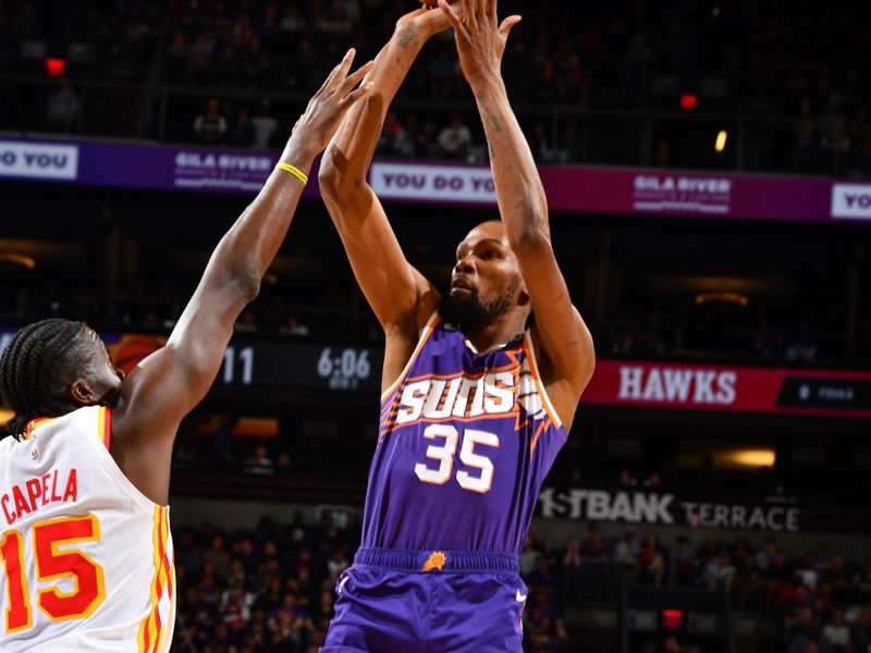 PHOENIX, AZ - MARCH 21:  Kevin Durant #35 of the Phoenix Suns shoots the ball during the game  on March 21, 2024 at Footprint Center in Phoenix, Arizona. NOTE TO USER: User expressly acknowledges and agrees that, by downloading and or using this photograph, user is consenting to the terms and conditions of the Getty Images License Agreement. Mandatory Copyright Notice: Copyright 2024 NBAE (Photo by Barry Gossage/NBAE via Getty Images)