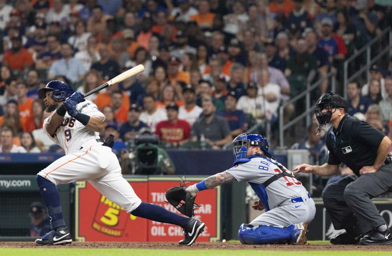 May 16, 2023; Houston, Texas, USA; Houston Astros left fielder Corey Julks (9) hits a double against there Chicago Cubs in the fourth inning at Minute Maid Park. Mandatory Credit: Thomas Shea-USA TODAY Sports