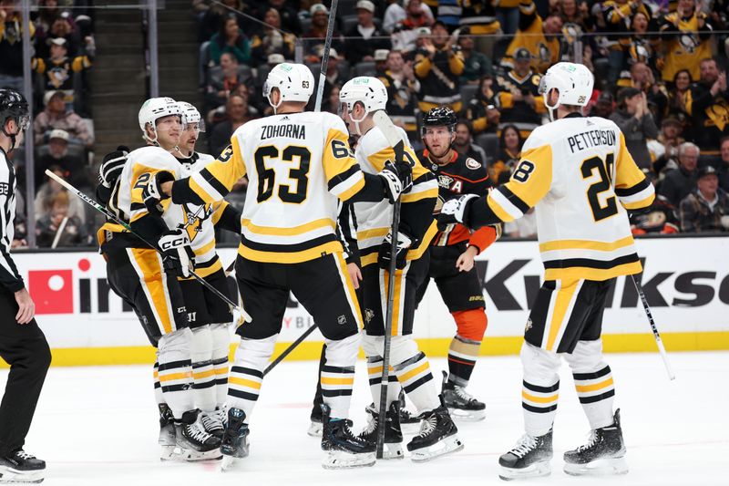 Nov 7, 2023; Anaheim, California, USA; Pittsburgh Penguins forward Radim Zohorna (63) celebrates with teammates after scoring a goal during the first period against the Anaheim Ducks at Honda Center. Mandatory Credit: Kiyoshi Mio-USA TODAY Sports