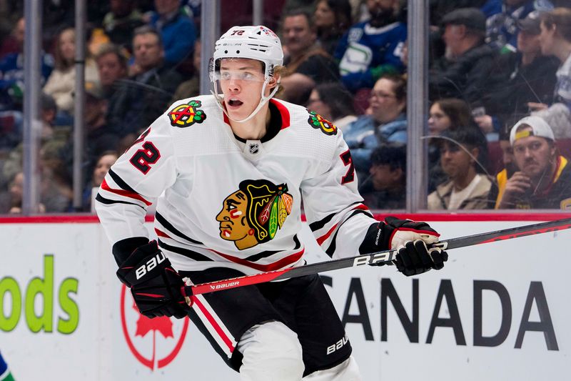 Apr 6, 2023; Vancouver, British Columbia, CAN; Chicago Blackhawks defenseman Alex Vlasic (72) skates against the Vancouver Canucks in the first period at Rogers Arena. Mandatory Credit: Bob Frid-USA TODAY Sports