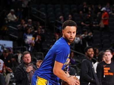 PHOENIX, AZ - DECEMBER 12: Stephen Curry #30 of the Golden State Warriors warms up before the game against the Phoenix Suns on December 12, 2023 at Footprint Center in Phoenix, Arizona. NOTE TO USER: User expressly acknowledges and agrees that, by downloading and or using this photograph, user is consenting to the terms and conditions of the Getty Images License Agreement. Mandatory Copyright Notice: Copyright 2023 NBAE (Photo by Garrett Ellwood/NBAE via Getty Images)