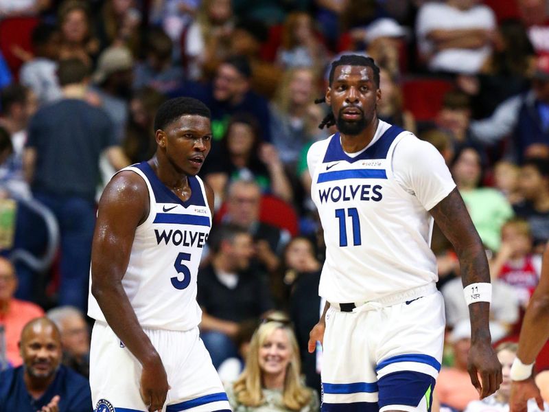 DES MOINES, IA -  OCTOBER 11: Anthony Edwards #5 and Naz Reid #11 of the Minnesota Timberwolves look on during the game against the Philadelphia 76ers during a NBA pre season game on October 11, 2024 at the Wells Fargo Arena in Des Moines, Iowa. NOTE TO USER: User expressly acknowledges and agrees that, by downloading and or using this Photograph, user is consenting to the terms and conditions of the Getty Images License Agreement. Mandatory Copyright Notice: Copyright 2024 NBAE (Photo by Jasey Bradwell/NBAE via Getty Images)