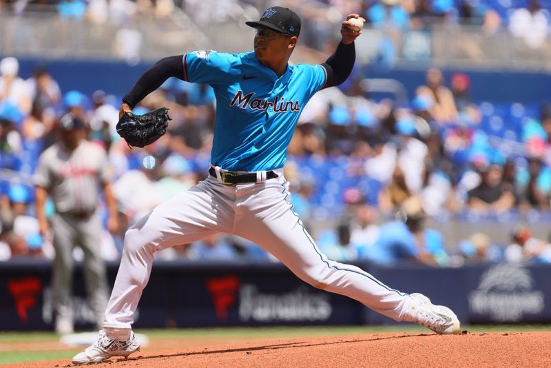 Apr 14, 2024; Miami, Florida, USA; Miami Marlins starting pitcher Jesus Luzardo (44) delivers a pitch against the Atlanta Braves during the first inning at loanDepot Park. Mandatory Credit: Sam Navarro-USA TODAY Sports