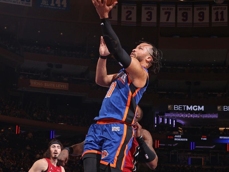 NEW YORK, NY - JANUARY 27: Jalen Brunson #11 of the New York Knicks drives to the basket during the game against the Miami Heat on January 27, 2024 at Madison Square Garden in New York City, New York.  NOTE TO USER: User expressly acknowledges and agrees that, by downloading and or using this photograph, User is consenting to the terms and conditions of the Getty Images License Agreement. Mandatory Copyright Notice: Copyright 2024 NBAE  (Photo by Nathaniel S. Butler/NBAE via Getty Images)