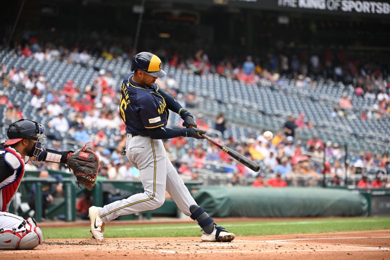 Aug 4, 2024; Washington, District of Columbia, USA; Milwaukee Brewers center fielder Blake Perkins (16) hits the ball into play against the Washington Nationals during the second inning at Nationals Park. Mandatory Credit: Rafael Suanes-USA TODAY Sports