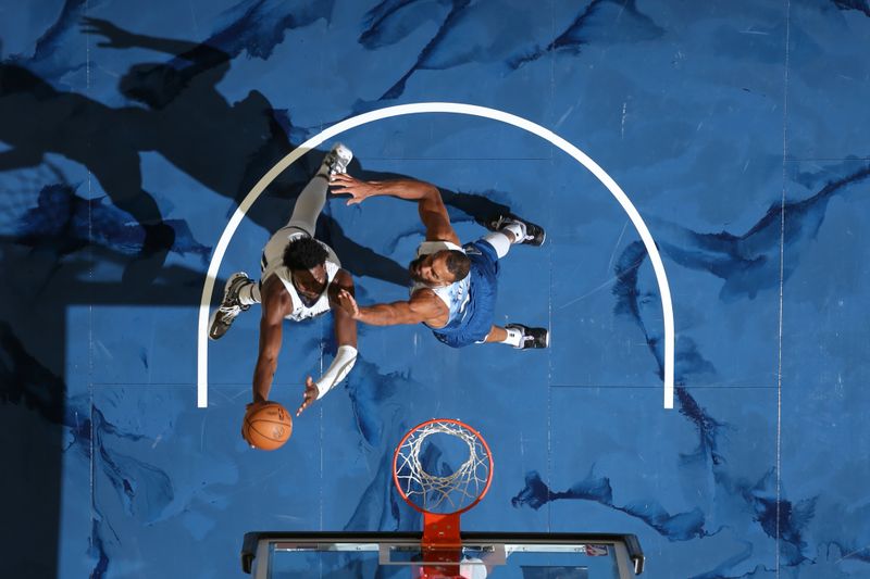 MINNEAPOLIS, MN -  FEBRUARY 28: Jaren Jackson Jr. #13 of the Memphis Grizzlies goes to the basket during the game on February 28, 2024 at Target Center in Minneapolis, Minnesota. NOTE TO USER: User expressly acknowledges and agrees that, by downloading and or using this Photograph, user is consenting to the terms and conditions of the Getty Images License Agreement. Mandatory Copyright Notice: Copyright 2024 NBAE (Photo by David Sherman/NBAE via Getty Images)