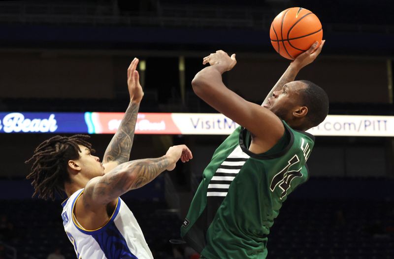 Dec 17, 2025; Pittsburgh, Pennsylvania, USA;  Binghamton Bearcats center Demetrius Lilley (14) shoots against Pittsburgh Panthers forward Cameron Corhen (left) during the first half at the Petersen Events Center. Mandatory Credit: Charles LeClaire-Imagn Images