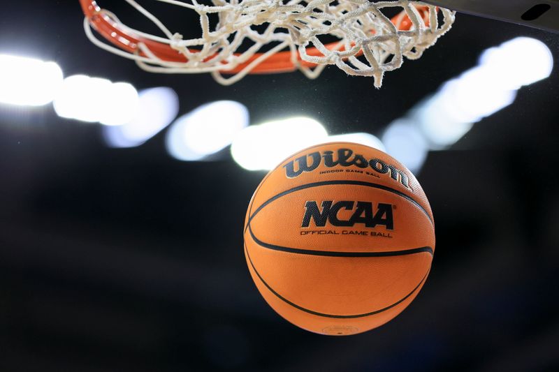 Feb 4, 2023; Cincinnati, Ohio, USA;  The NCAA logo is seen on a Wilson game ball during a free throw attempt in the game between the UCF Knights and the Cincinnati Bearcats in the second half at Fifth Third Arena. Mandatory Credit: Aaron Doster-USA TODAY Sports