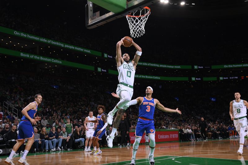 BOSTON, MA - APRIL 11: Jayson Tatum #0 of the Boston Celtics dunks the ball during the game against the New York Knicks on April 11, 2024 at the TD Garden in Boston, Massachusetts. NOTE TO USER: User expressly acknowledges and agrees that, by downloading and or using this photograph, User is consenting to the terms and conditions of the Getty Images License Agreement. Mandatory Copyright Notice: Copyright 2024 NBAE  (Photo by Brian Babineau/NBAE via Getty Images)