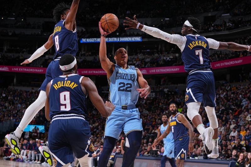 DENVER, CO - MARCH 25: Desmond Bane #22 of the Memphis Grizzlies drives to the basket during the game against the Denver Nuggets on March 25, 2024 at the Ball Arena in Denver, Colorado. NOTE TO USER: User expressly acknowledges and agrees that, by downloading and/or using this Photograph, user is consenting to the terms and conditions of the Getty Images License Agreement. Mandatory Copyright Notice: Copyright 2024 NBAE (Photo by Bart Young/NBAE via Getty Images)