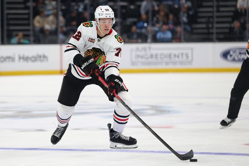 Mar 1, 2026; Salt Lake City, Utah, USA; Chicago Blackhawks defenseman Alex Vlasic (72) advances the puck against the Utah Mammoth during the third period at Delta Center. Mandatory Credit: Rob Gray-Imagn Images
