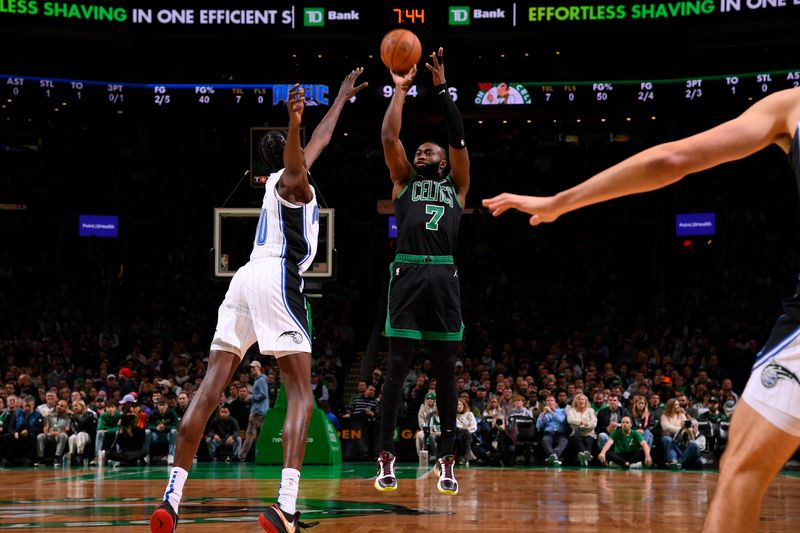 BOSTON, MA - DECEMBER 16: Jaylen Brown #7 of the Boston Celtics shoots the ball during the game against the Orlando Magic on December 16, 2022 at the TD Garden in Boston, Massachusetts.  NOTE TO USER: User expressly acknowledges and agrees that, by downloading and or using this photograph, User is consenting to the terms and conditions of the Getty Images License Agreement. Mandatory Copyright Notice: Copyright 2022 NBAE  (Photo by Brian Babineau/NBAE via Getty Images)