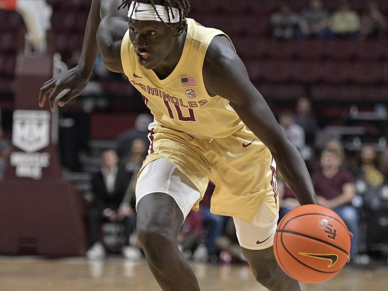 Jan 29, 2025; Tallahassee, Florida, USA; Florida State Seminoles forward Taylor Bol Bowen (10) drives to the net during the first half against the Virginia Tech Hokies at Donald L. Tucker Center. Mandatory Credit: Melina Myers-Imagn Images