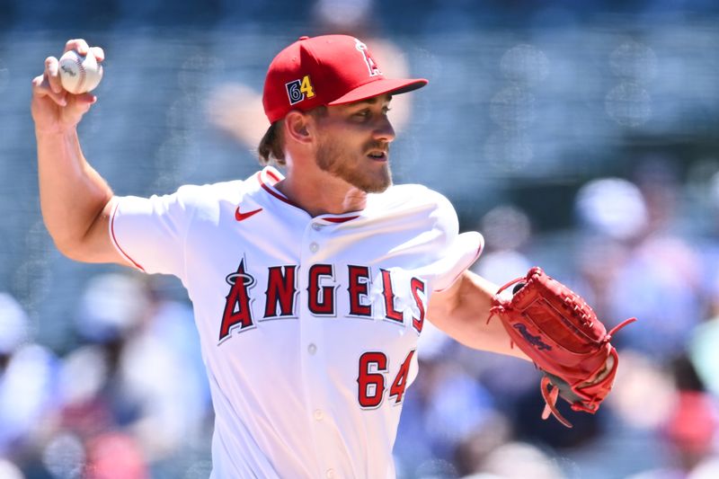 Aug 18, 2024; Anaheim, California, USA; Los Angeles Angels pitcher Jack Kochanowicz (64) throws a pitch against the Atlanta Braves during the first inning at Angel Stadium. Mandatory Credit: Jonathan Hui-USA TODAY Sports
