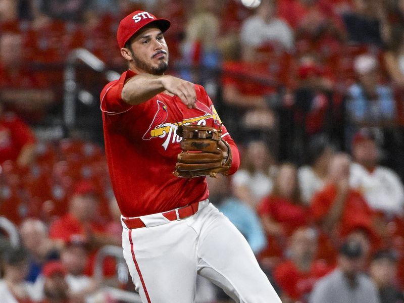 Aug 7, 2024; St. Louis, Missouri, USA;  St. Louis Cardinals third baseman Nolan Arenado (28) throws on the run against the Tampa Bay Rays during the seventh inning at Busch Stadium. Mandatory Credit: Jeff Curry-USA TODAY Sports