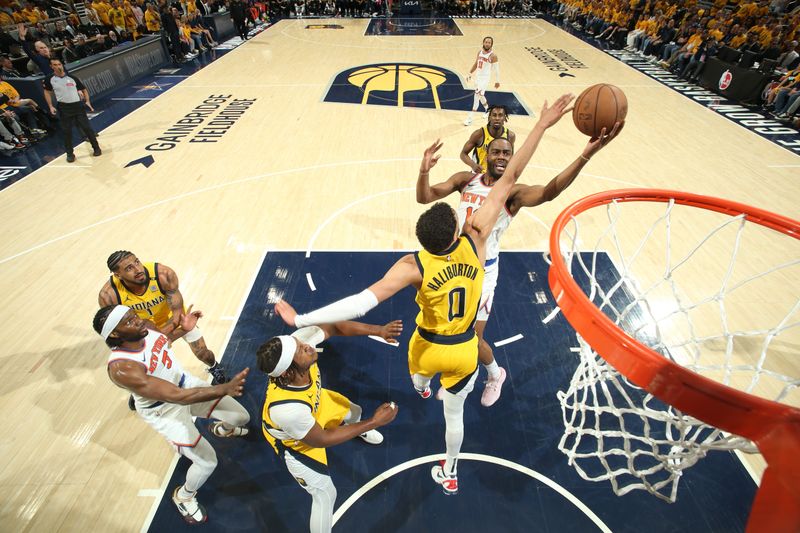 INDIANAPOLIS, IN - MAY 17: Alec Burks #18 of the New York Knicks drives to the basket during the game against the Indiana Pacers during Round 2 Game 6 of the 2024 NBA Playoffs on May 17, 2024 at Gainbridge Fieldhouse in Indianapolis, Indiana. NOTE TO USER: User expressly acknowledges and agrees that, by downloading and or using this Photograph, user is consenting to the terms and conditions of the Getty Images License Agreement. Mandatory Copyright Notice: Copyright 2024 NBAE (Photo by Nathaniel S. Butler/NBAE via Getty Images)