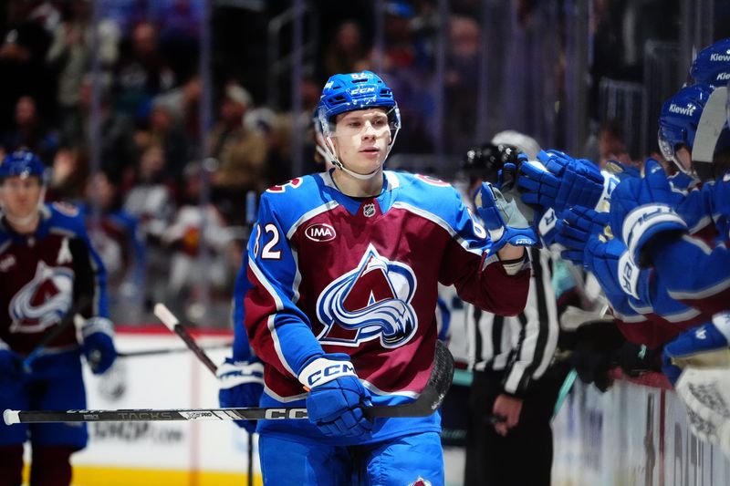 Nov 5, 2024; Denver, Colorado, USA; Colorado Avalanche center Ivan Ivan (82) celebrates his goal in the third period against the Seattle Kraken at Ball Arena. Mandatory Credit: Ron Chenoy-Imagn Images