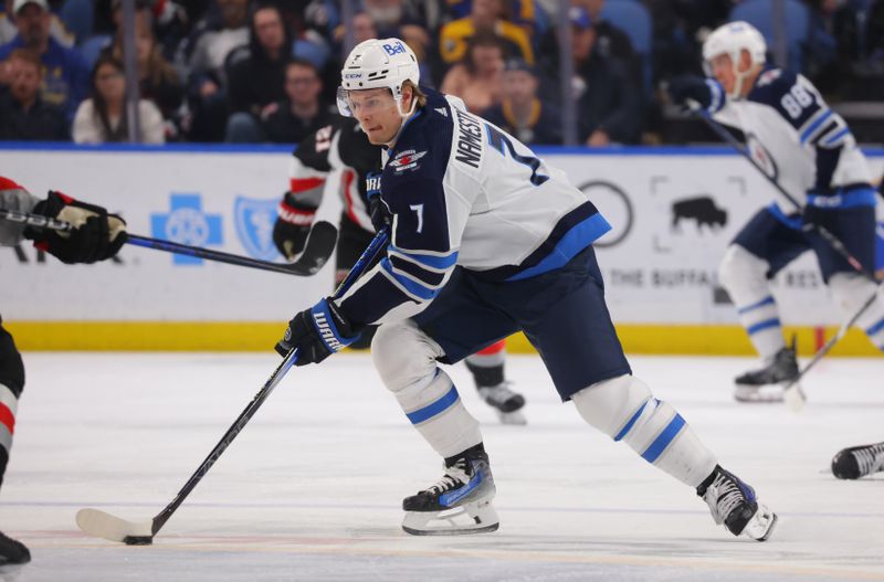 Mar 3, 2024; Buffalo, New York, USA;  Winnipeg Jets center Vladislav Namestnikov (7)skates up ice with the puck during the third period against the Buffalo Sabres at KeyBank Center. Mandatory Credit: Timothy T. Ludwig-USA TODAY Sports