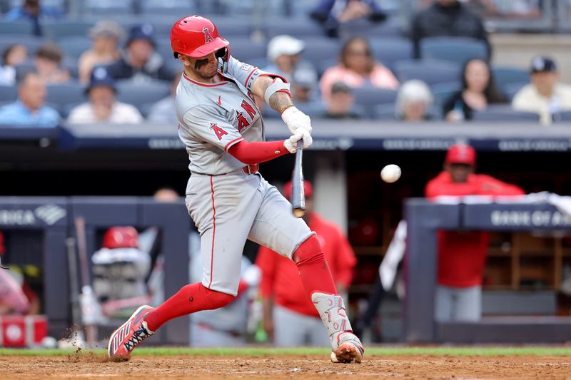 Aug 7, 2024; Bronx, New York, USA; Los Angeles Angels shortstop Zach Neto (9) hits a two run home run against the New York Yankees during the seventh inning at Yankee Stadium. Mandatory Credit: Brad Penner-USA TODAY Sports